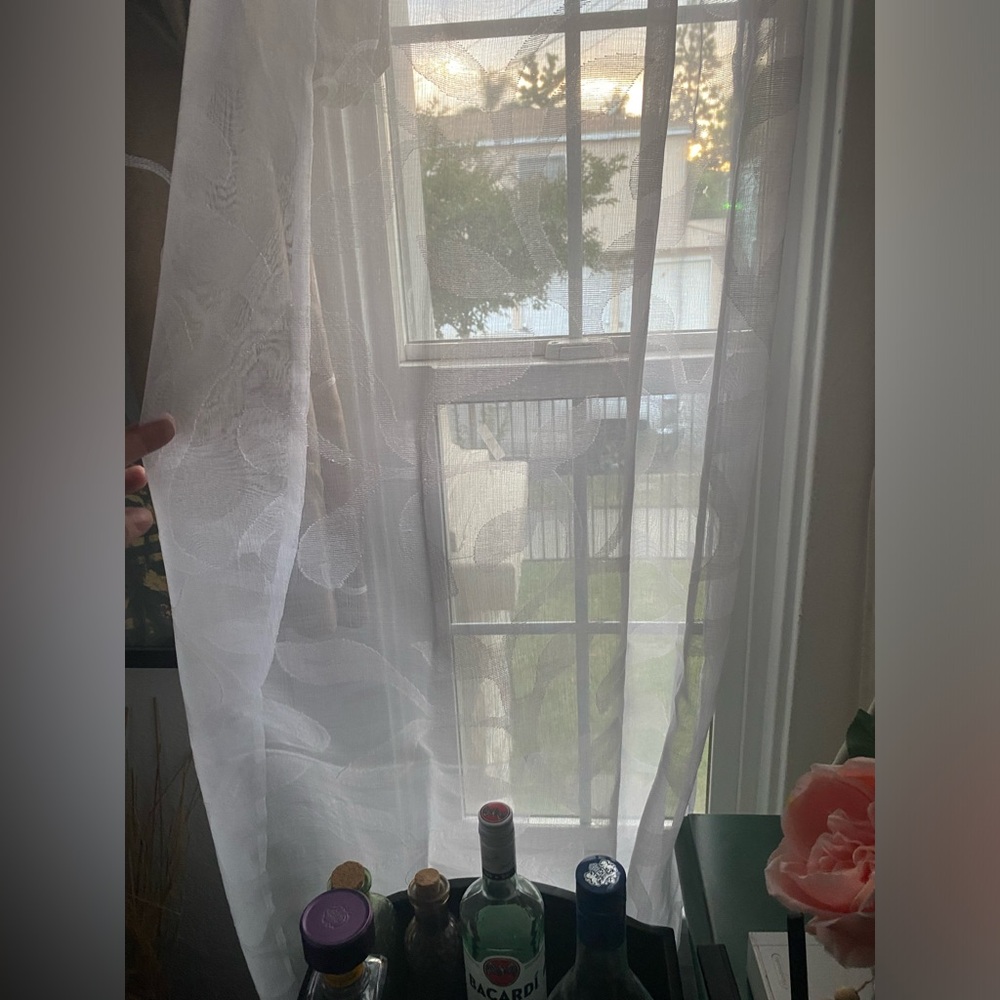 Sheer white curtains with leaf like pattern 84’ in long 4 panel